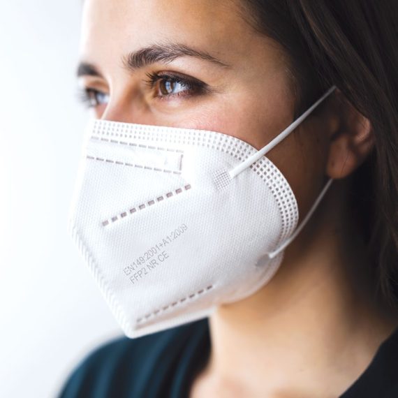 Receptionist Woman In Medical Face Mask